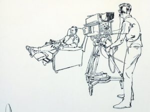 Larry Salk: TV camera and man in chair